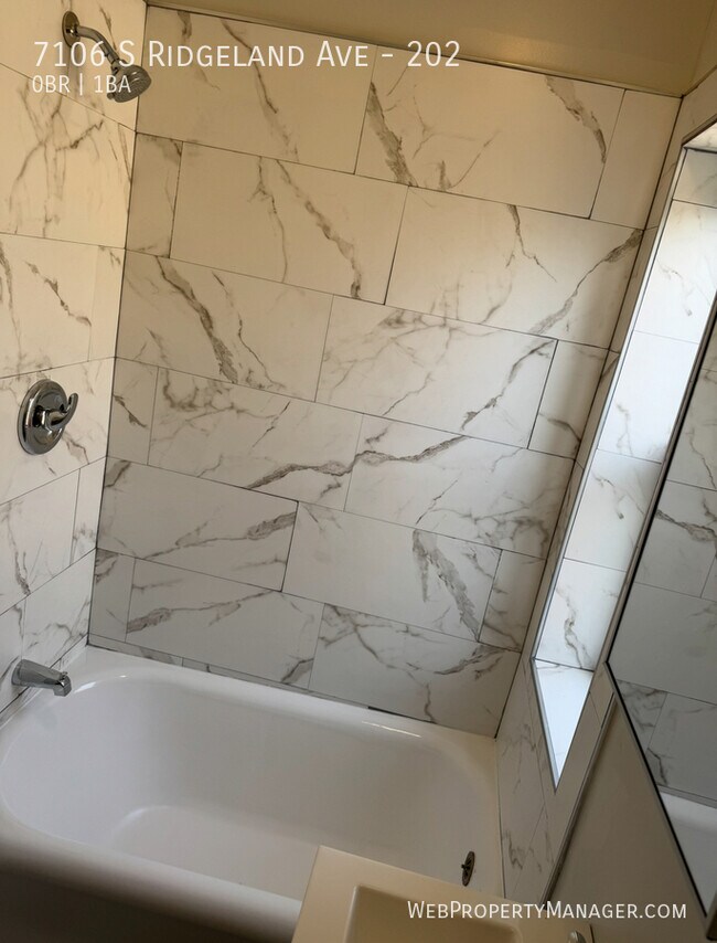 Foto del edificio - 7106 S Ridgeland Ave