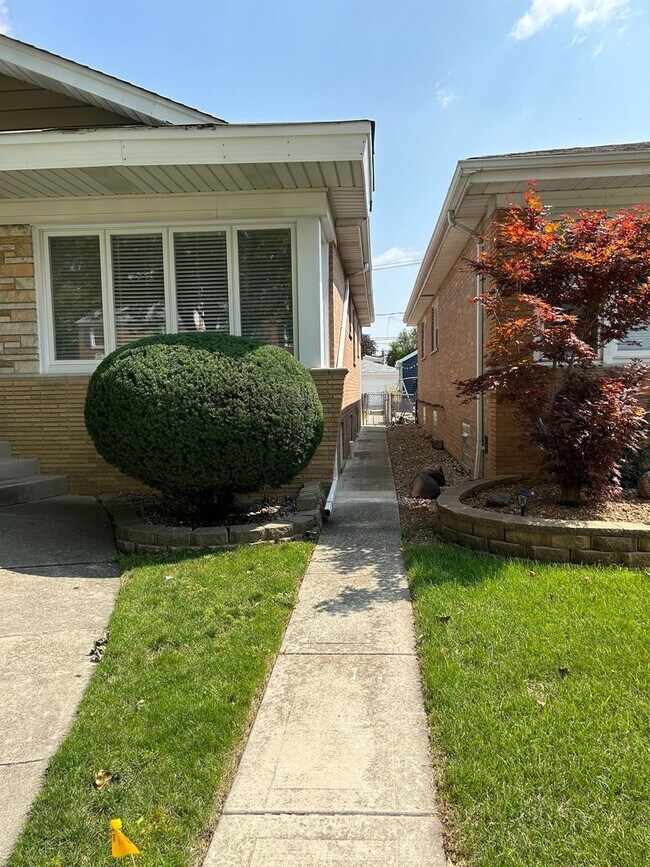 Building Photo - 5725 S Newland Ave