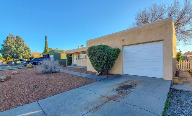 Building Photo - UPTOWN 3 Bedroom +Office  2 Bath with Garage