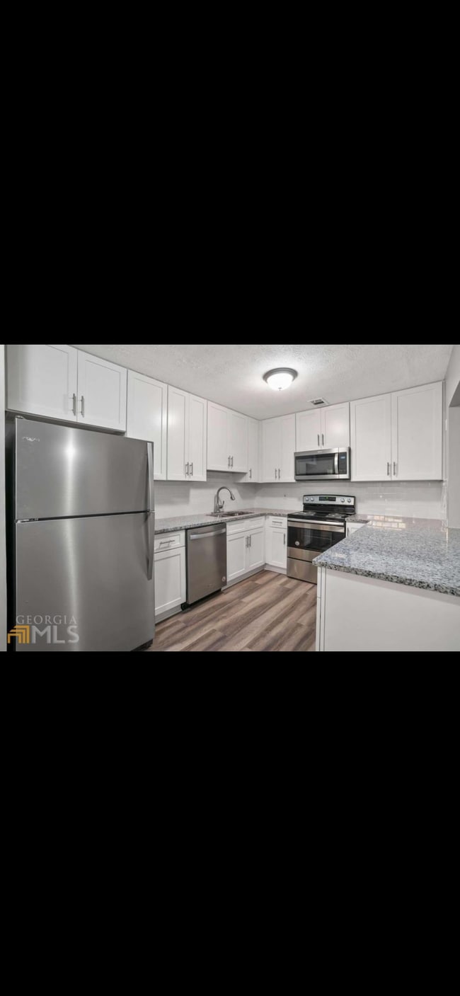 Foto del edificio - 325 Winding River Dr