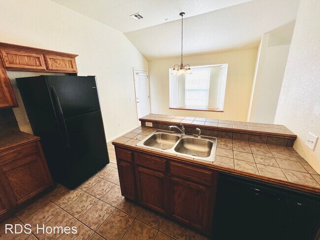Building Photo - 4 br, 2 bath House - 1829 Creekside Dr