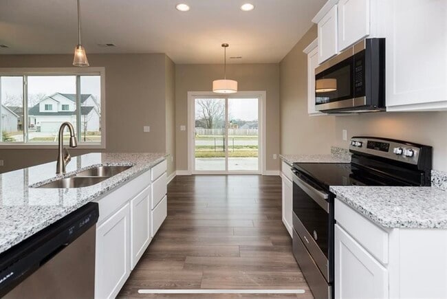 Cocina/comedor de planta abierta - 9614 Turnpoint Dr