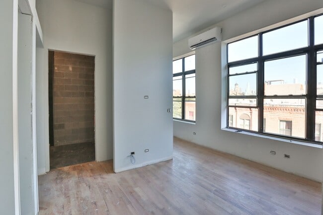 Building Photo - Brand New ARO Affordable Studio in Wicker Park. 12' Ceilings. Huge Windows, Elevator Building. Ro...