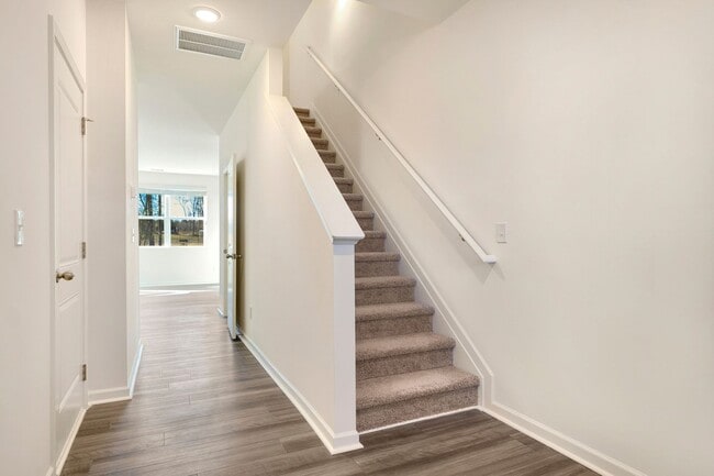 Building Photo - Brand-new, end-unit townhome!