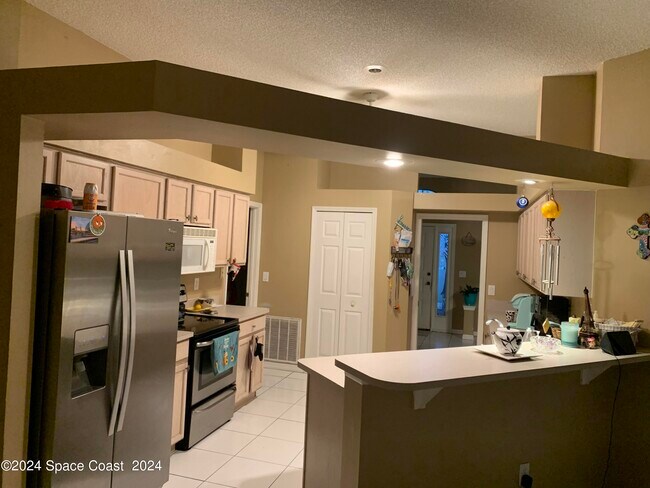 Foto del edificio - 6940 Hammock Trace Dr