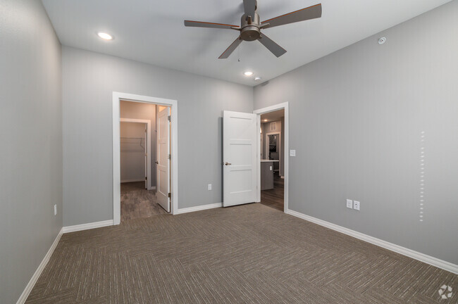 2BR, 2BA - 1155SF - Primary Bedroom - The Crescent Apartments