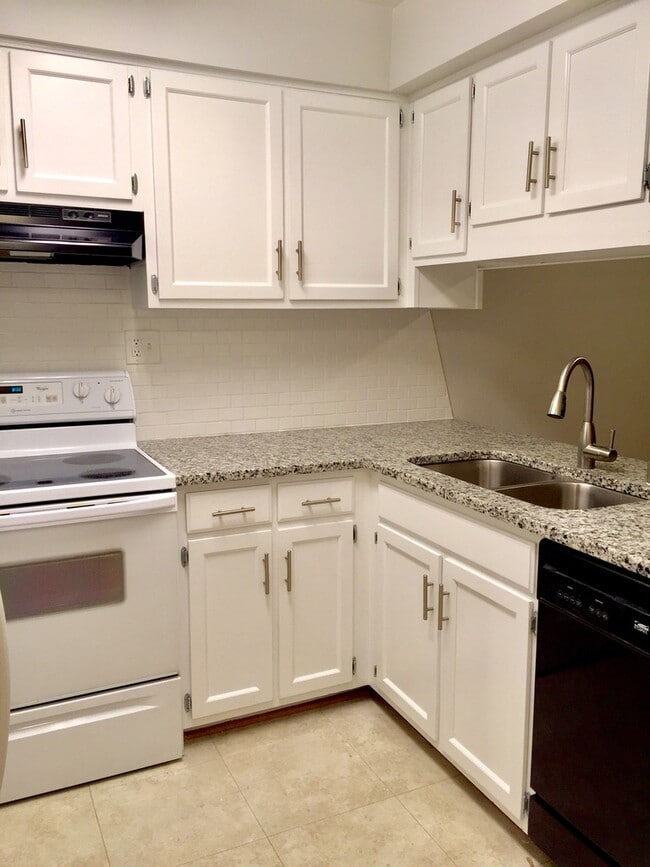 Designer Granite Countertops & Subway Backsplash - 124 S Sherrin Ave