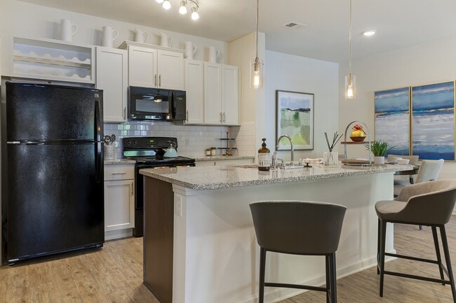 Building Photo - Skyland Exchange Apartments