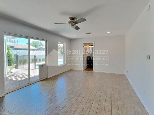 Building Photo - 4 br, 3 bath House - 8432 E Sage Dr -