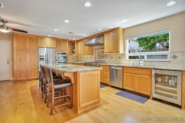 Building Photo - 4BR/2BA HOME w/ SOLAR & attached garage in...