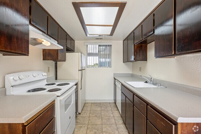 Plano 2 - 2 habitaciones, 1 baño - 871 pies cuadrados - Cocina - Riverbank Condominiums