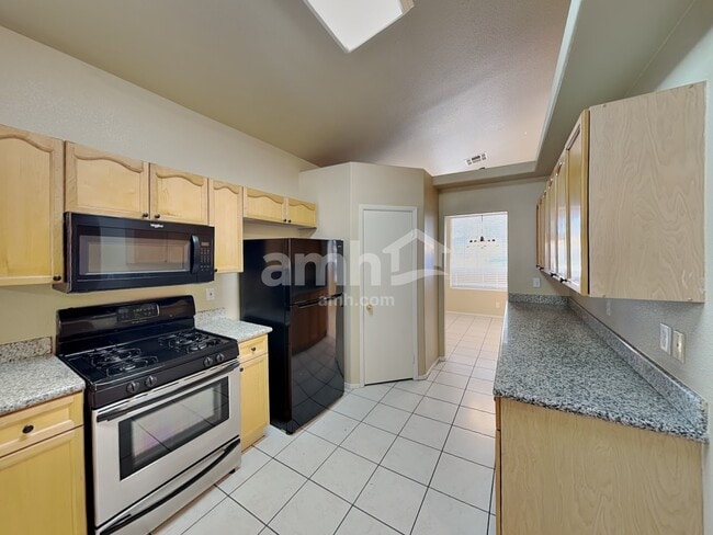 Building Photo - 8340 Spruce Meadows Ave