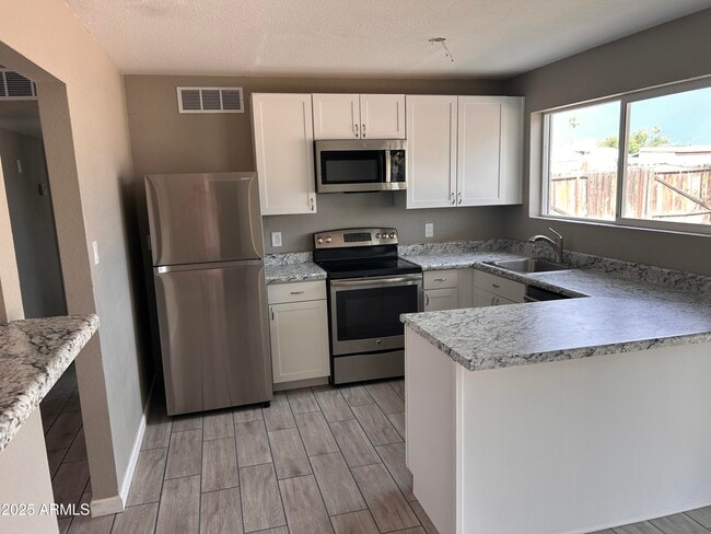 Foto del edificio - 4736 E Burgess Ln