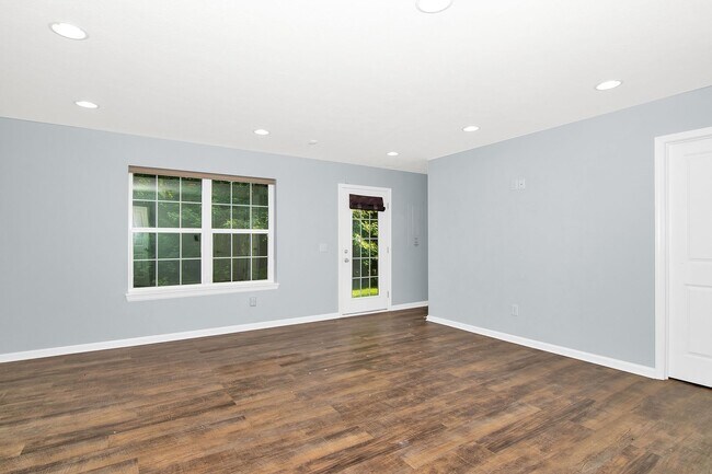 Building Photo - Experience a Spacious Modern Living at Pri...