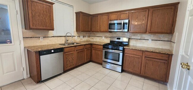 Foto del edificio - 9710 Fieldbloom Ln