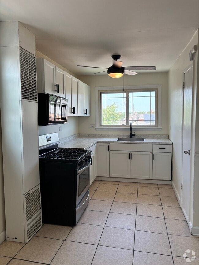 Building Photo - 5200 S Lorel Ave