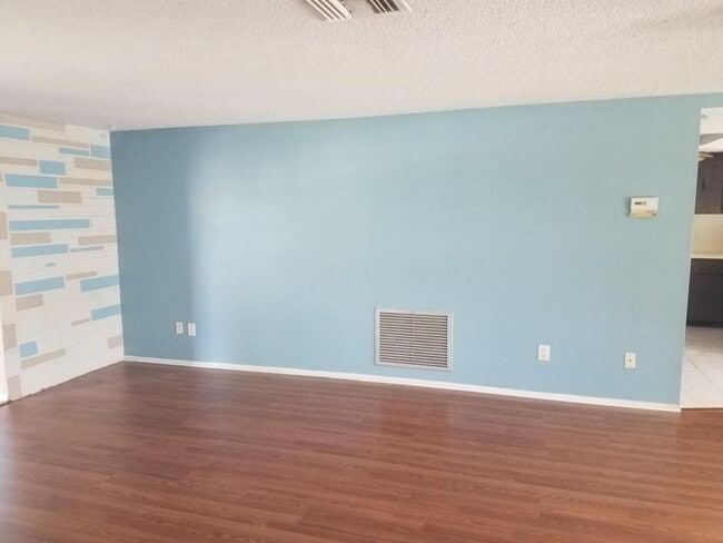 Building Photo - 6643 Carnation Way