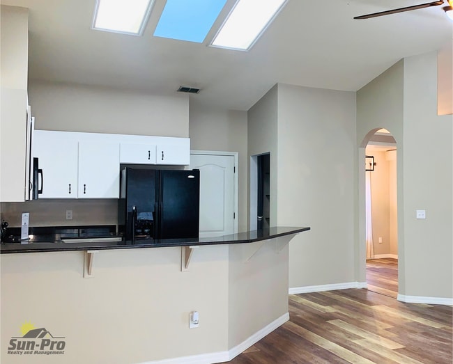 Building Photo - 5988 Sawgrass Point Dr