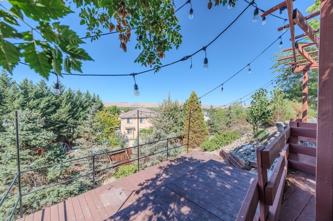 Building Photo - COMING SOON! Welcome to this stunning 4-be...