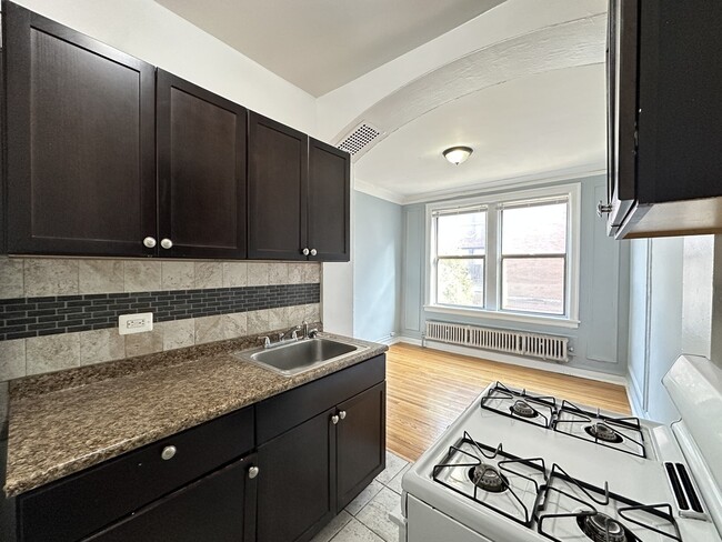 Building Photo - 1373 W Estes Ave