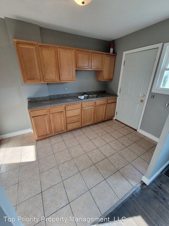 Foto del edificio - 2 br, 1 bath House - 1240 W Mullan Ave