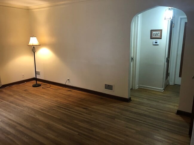 living room with hallway to the right - 3536 N 47th Ave