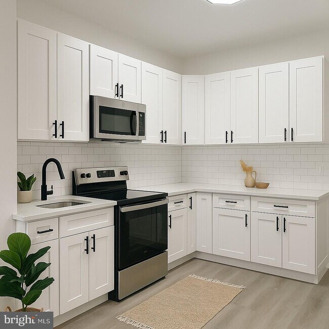 Foto del edificio - 1703-5 Belfield Ave