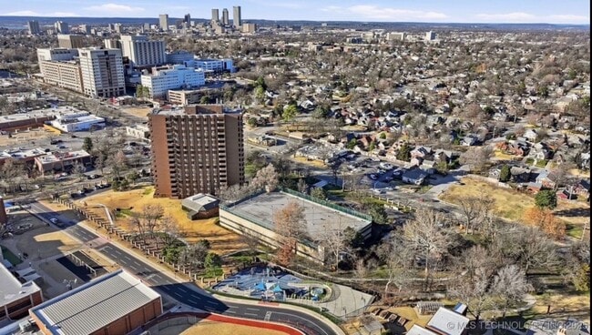 Building Photo - Experience Luxury and Prestige at Yorktown Condominiums