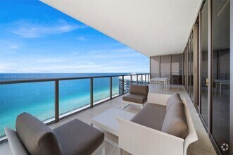 Building Photo - 9701 Collins Ave