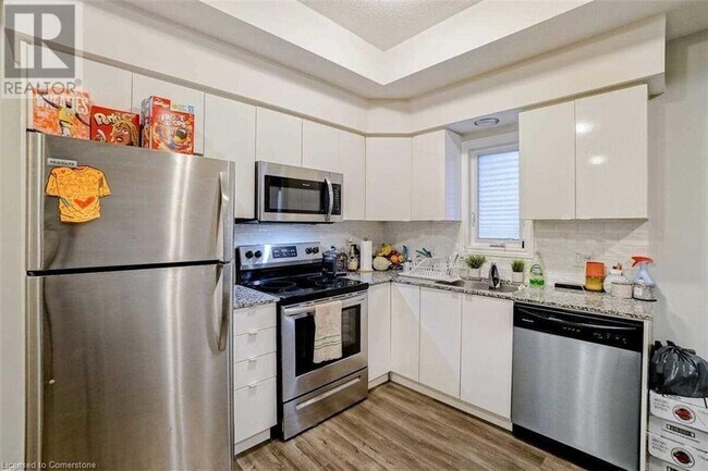 Photo du bâtiment - 1438 Highland Rd W