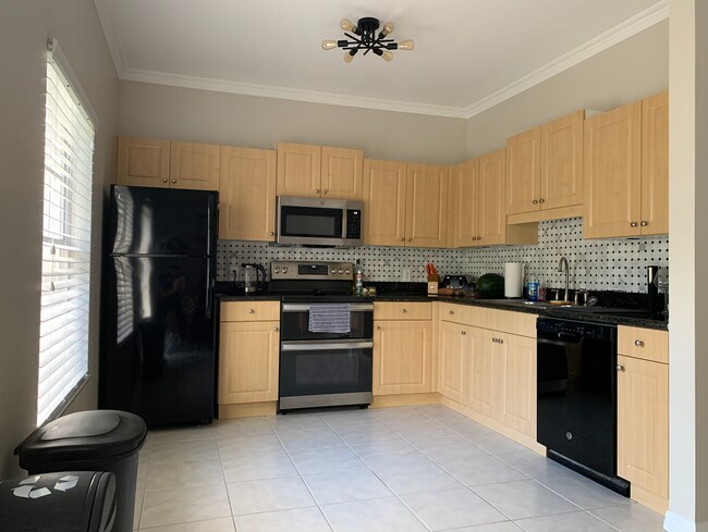 Photo - 7679 Plantation Cir Townhome