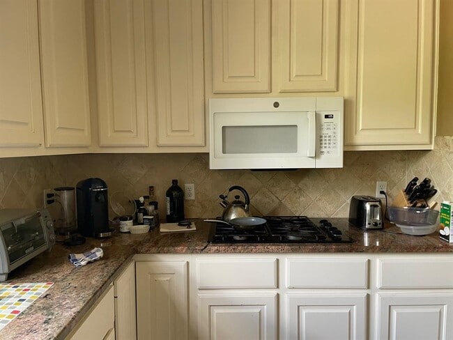 Building Photo - 8028 Bottlebrush Dr