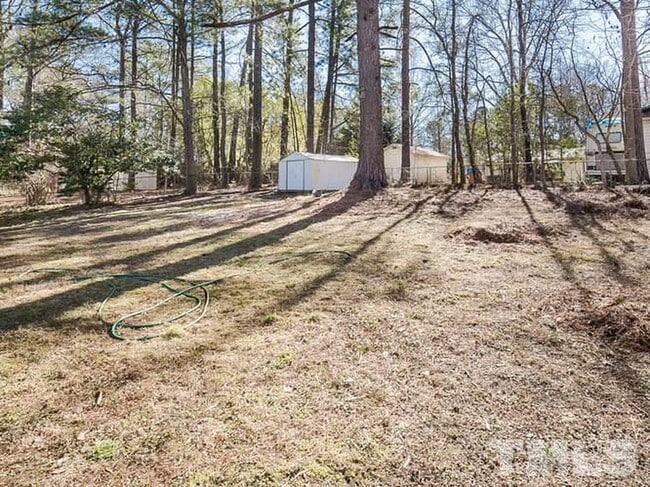 backyard with large storage shed - 515 Mayfair St