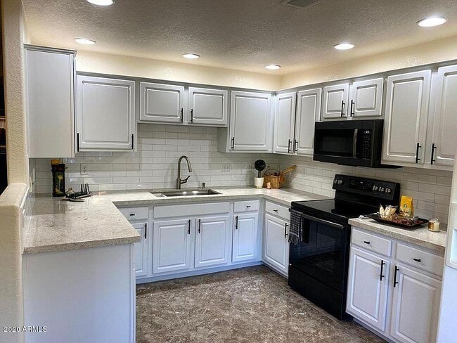 Building Photo - 9555 E Raintree Dr
