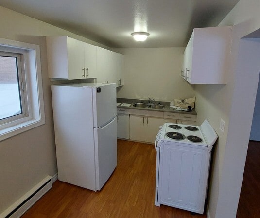 Building Photo - Hemlock Place Apartments