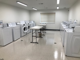 Spacious Laundry Room - Timberfield Apartments