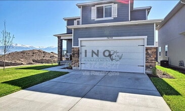Building Photo - 7478 N Hutch Ln