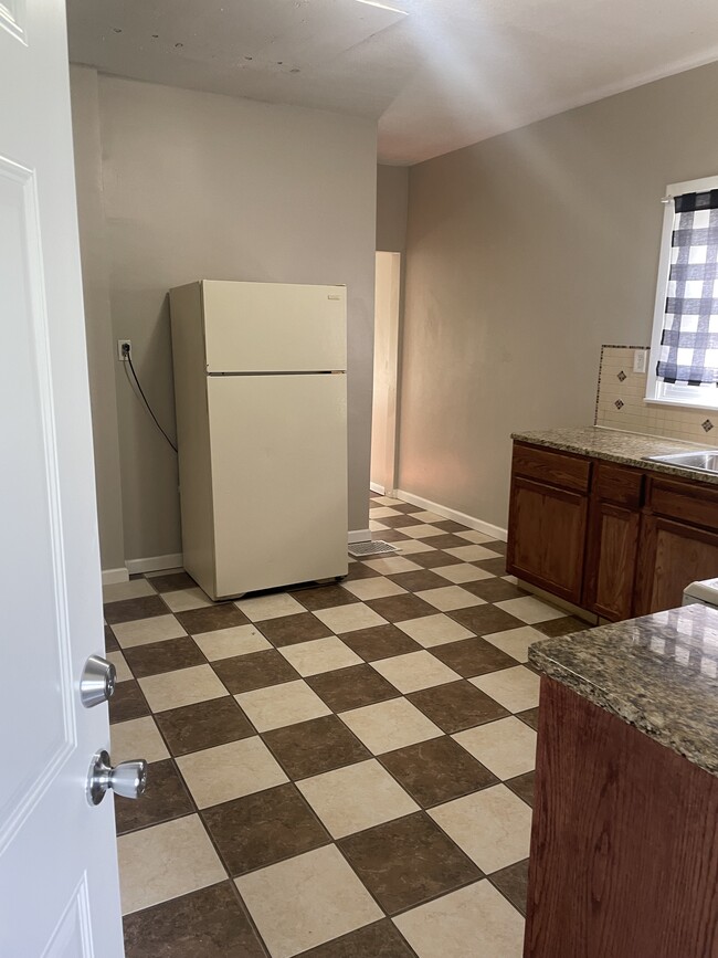 Large kitchen with stove and fridge, updated cabinets and counter top - 419 18th Avenue a