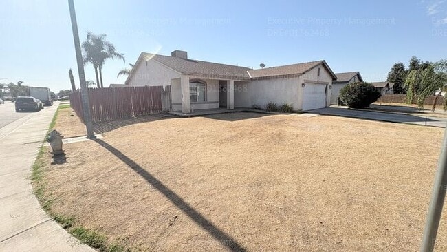 Building Photo - 4 bedroom 2 bathroom home located near S. H St/ Berkshire Rd