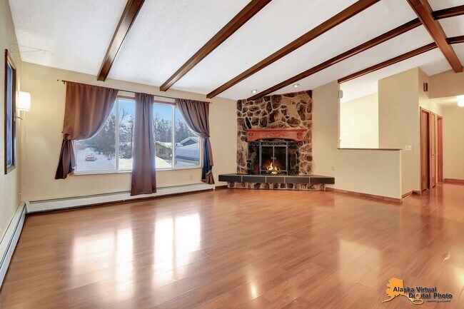 Building Photo - Spacious Home with Garage & Fenced Yard Near JBER & Major Hospitals