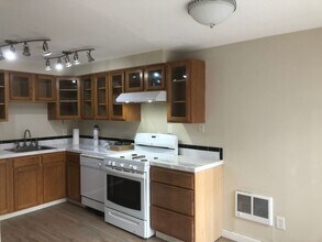 Building Photo - 9469-9473-9473 N Saint Louis Ave
