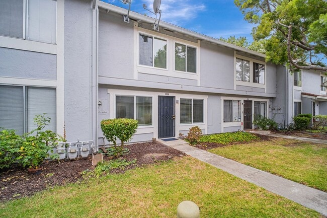 Building Photo - 2-story condo featuring 2 bedrooms and 1.5...