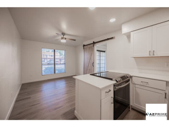 Building Photo - Fall In Love With This Stunningly Upgraded 1/1 First-Floor Phoenix Condo, Designed For Effortless Li
