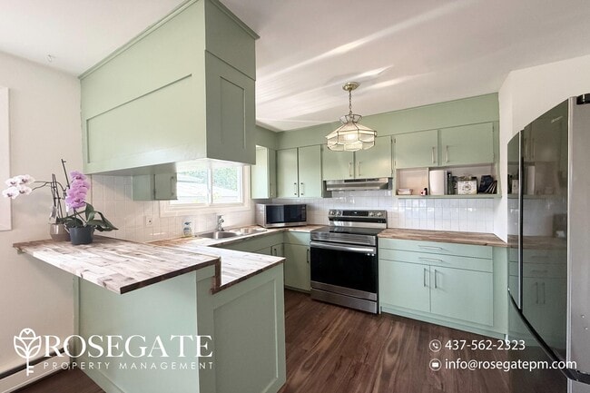 Building Photo - Bright & Renovated 3-Bedroom Unit in Centr...