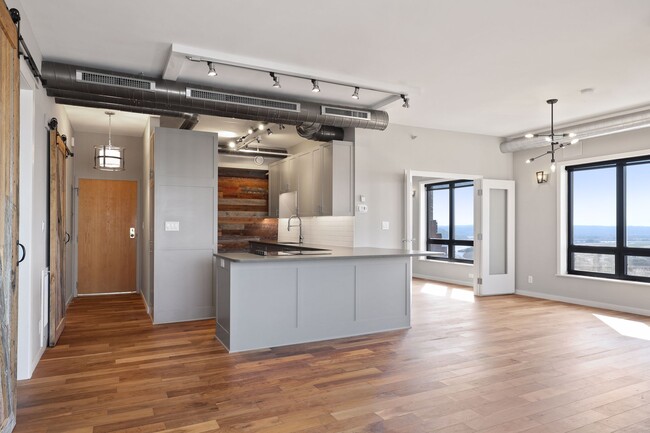 Industrial Features and Designer Lighting throughout - 168 6th St E