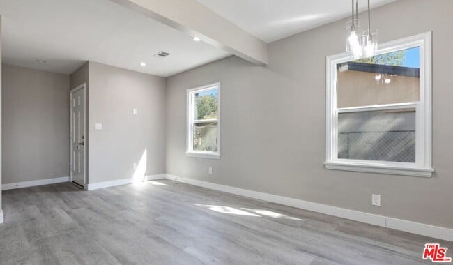 Building Photo - 9217 Langdon Ave