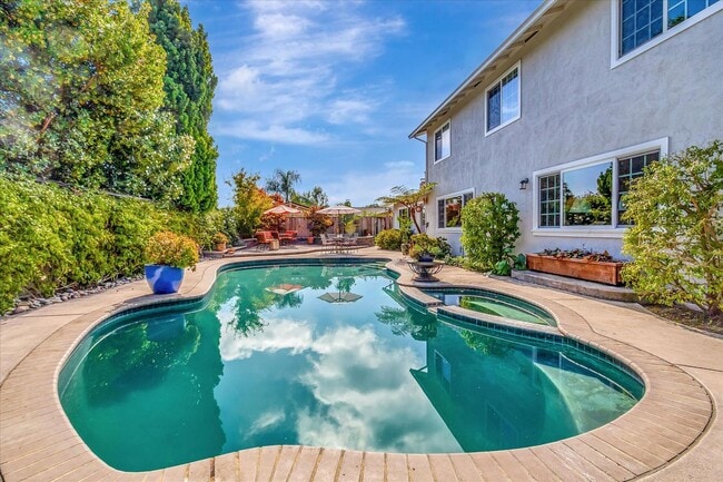 Building Photo - Executive Oasis l Huge Lot with Lush Green...