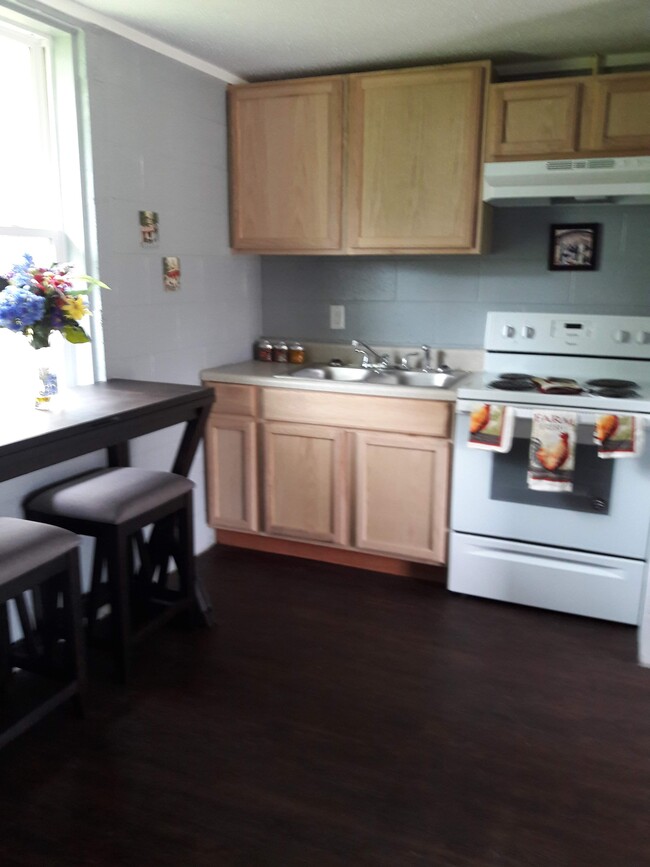 Include stove & refrigerator - 219 Adams Ave