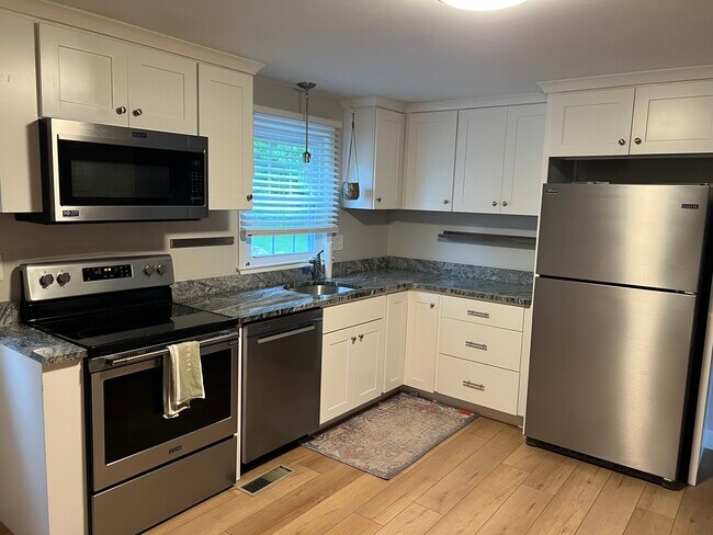 Kitchen with Granite Countertops and Stainless Steel Appliances - 15 Townhouse Rd