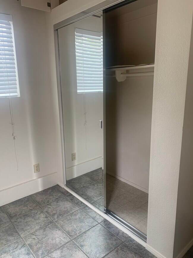 Closetw/ 2 top cabinets - 2112 52nd St